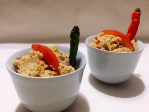 Eggs and tomatoes steamed with poppy seeds