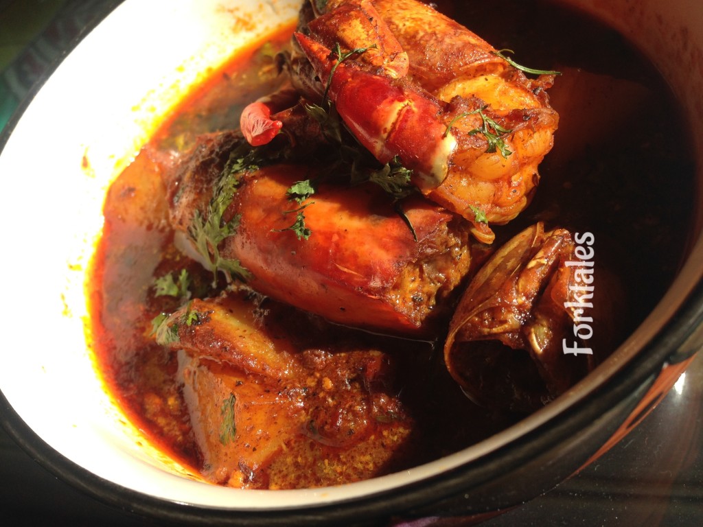 Bengali style prawn curry cooked with cumin and ginger.