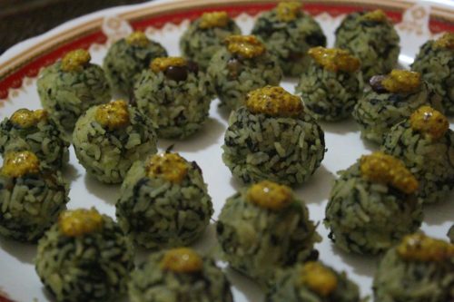 Spinach and rice balls with dollops of kasundi